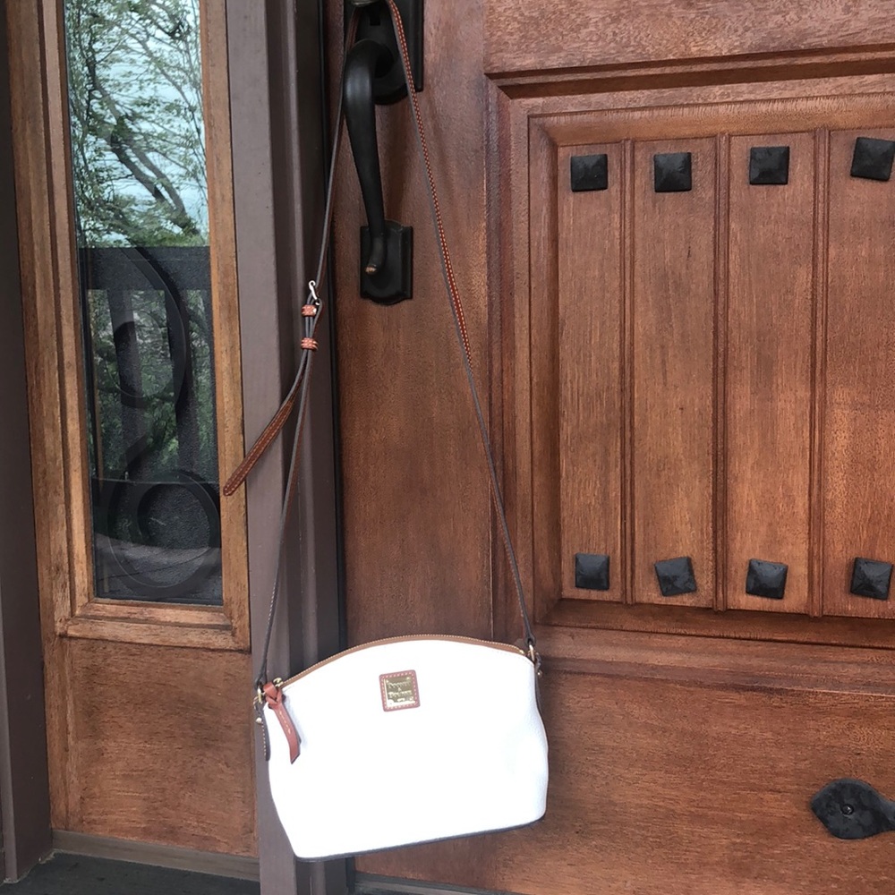 Dooney & Bourke white pebbled leather purse.